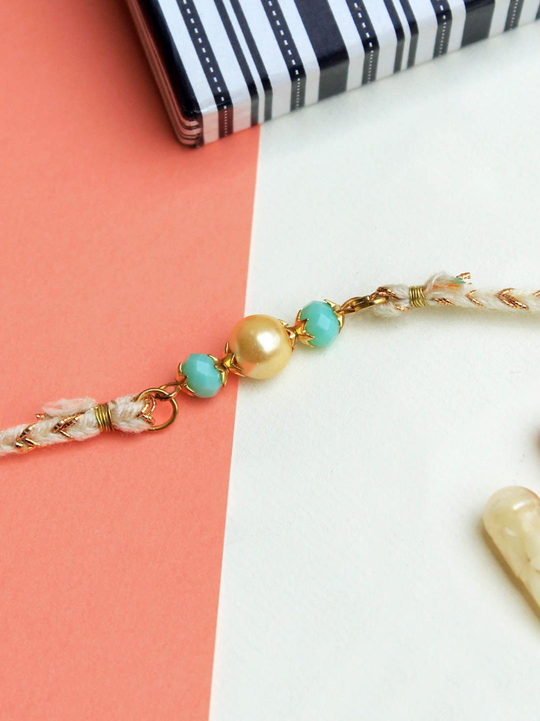 

BeAbhika Beaded Braid Thread Rakhi With Roli Chawal, White