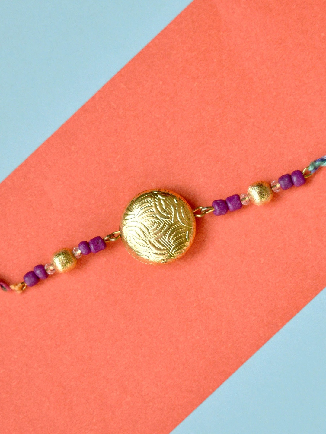 

BeAbhika Crescent Beaded Thread Rakhi With Roli & Chawal Vegan Capsules, Gold