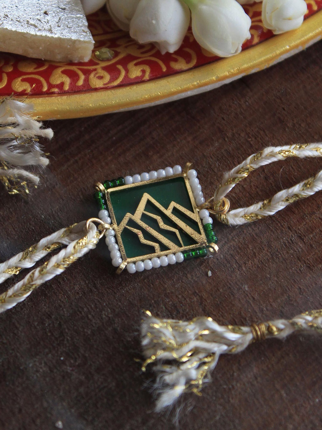 

BeAbhika Higher Calling Laser Cut Mountain Thread Rakhi With Roli Chawal, Green