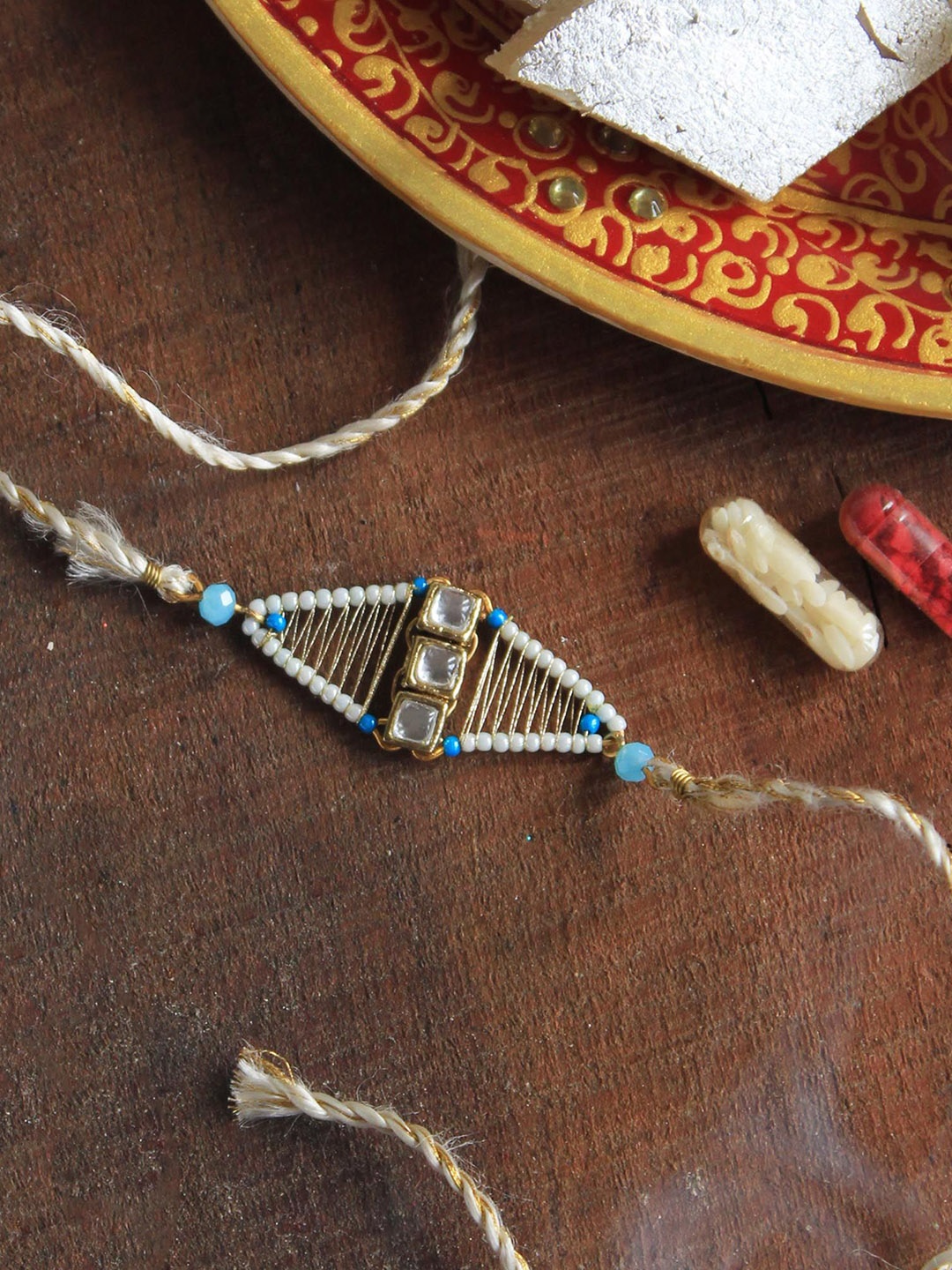 

BeAbhika Kundan Studded Thread Rakhi With Roli Chawal, White