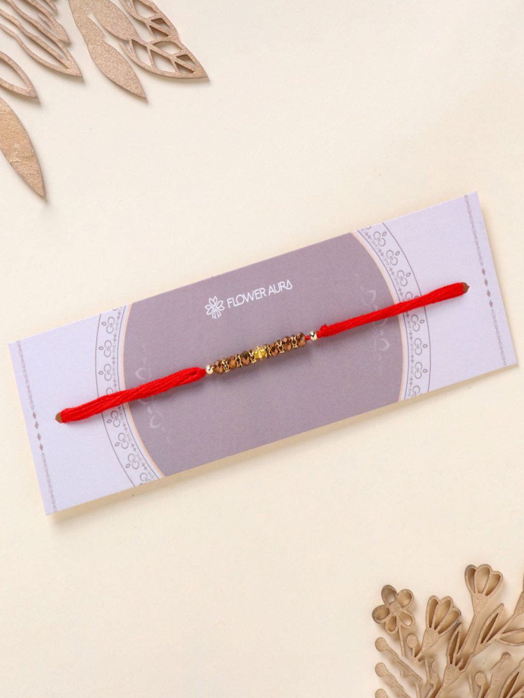 

Floweraura Beaded Stone Mauli Rakhi Bracelet With Roli Chawal, Gold