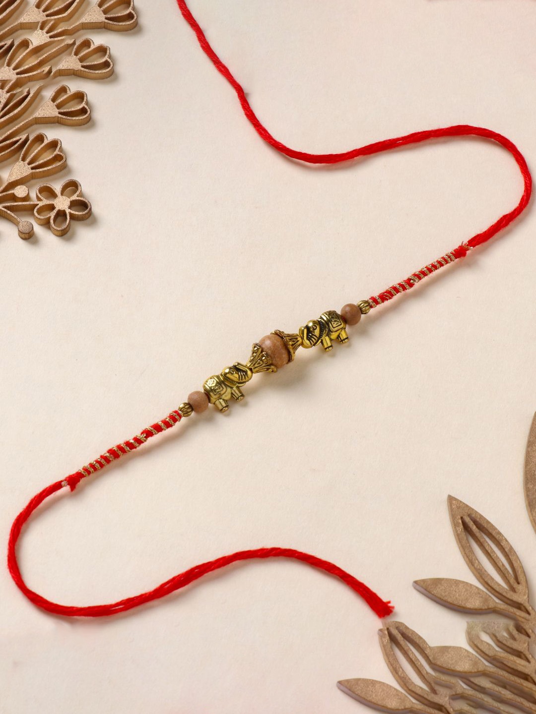 

Floweraura Elephant Beaded Oxidized Thread Rakhi With Roli Chawal, Gold