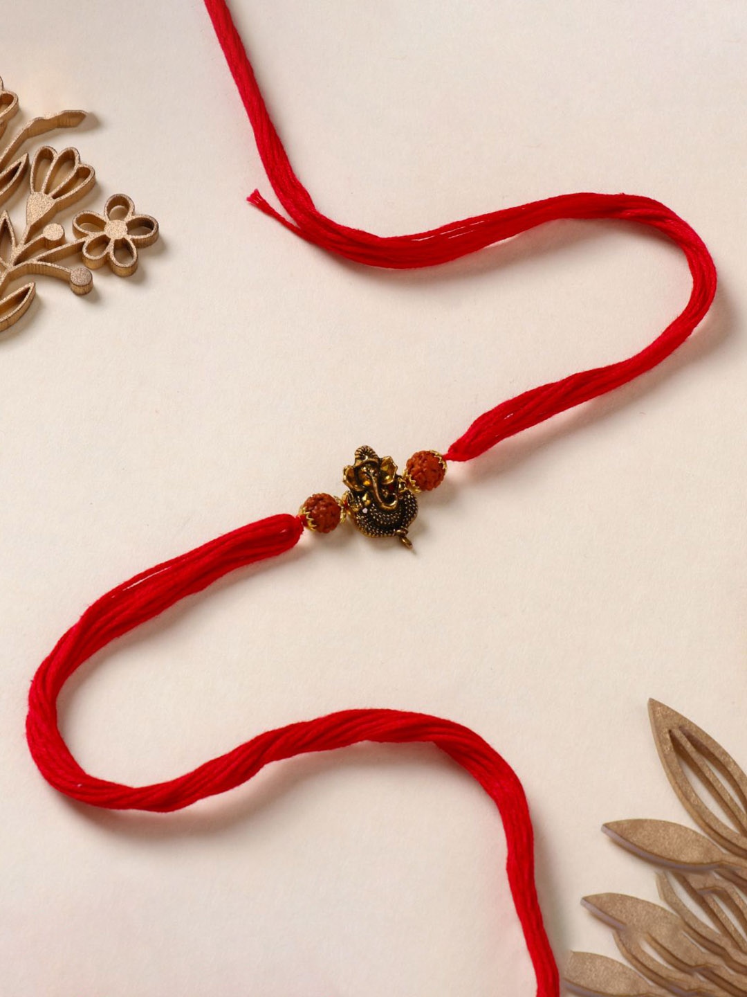 

Floweraura Glorious Ganesha Charm Rakhi Bracelet With Roli Chawal, Gold