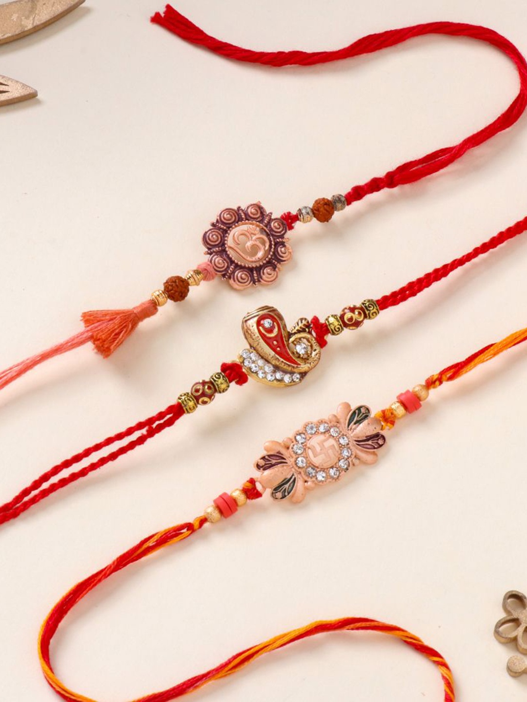 

Floweraura Set Of 3 Stone Studded & Beaded Thread Rakhis With Roli Chawal, Red