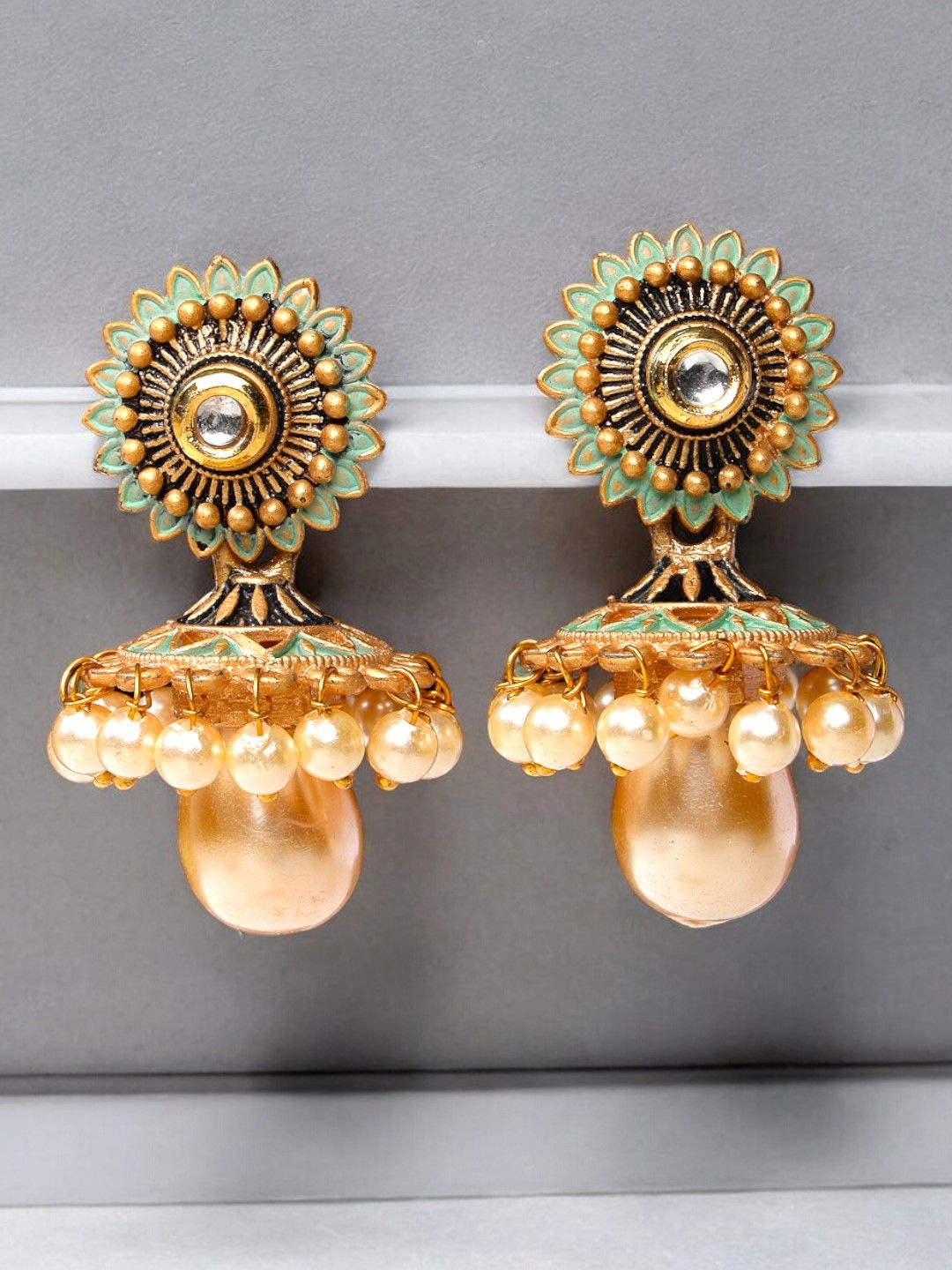 

ADIVA Gold Plated Kundan Studded & Pearl Beaded Antique Floral Shaped Jhumkas