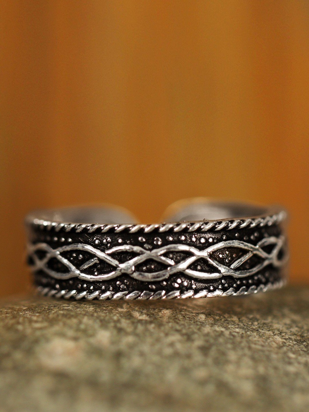 

Exotic India Sterling Silver Engraved Endless Lines Finger Ring