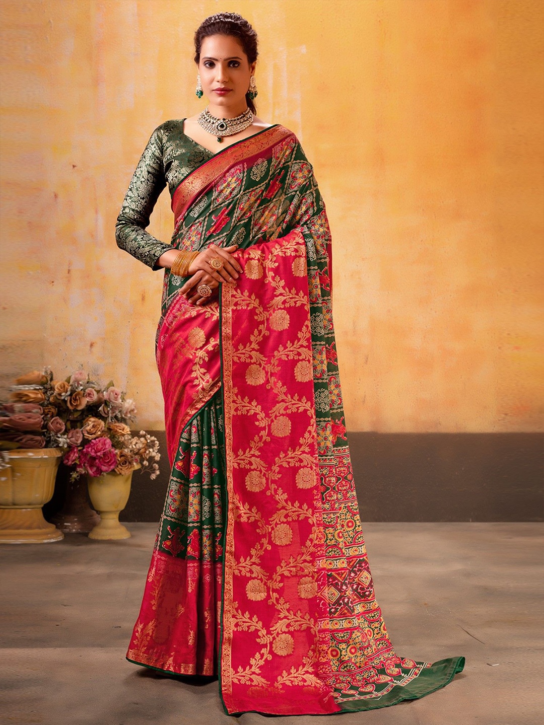 

Panzora Ethnic Motifs Woven Design Zari Patola Saree, Green