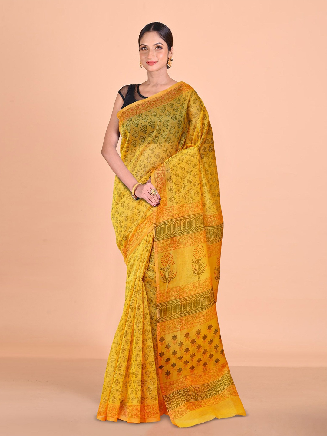 

Unnati Silks Ethnic Motifs Supernet Handloom Block Print Saree, Yellow