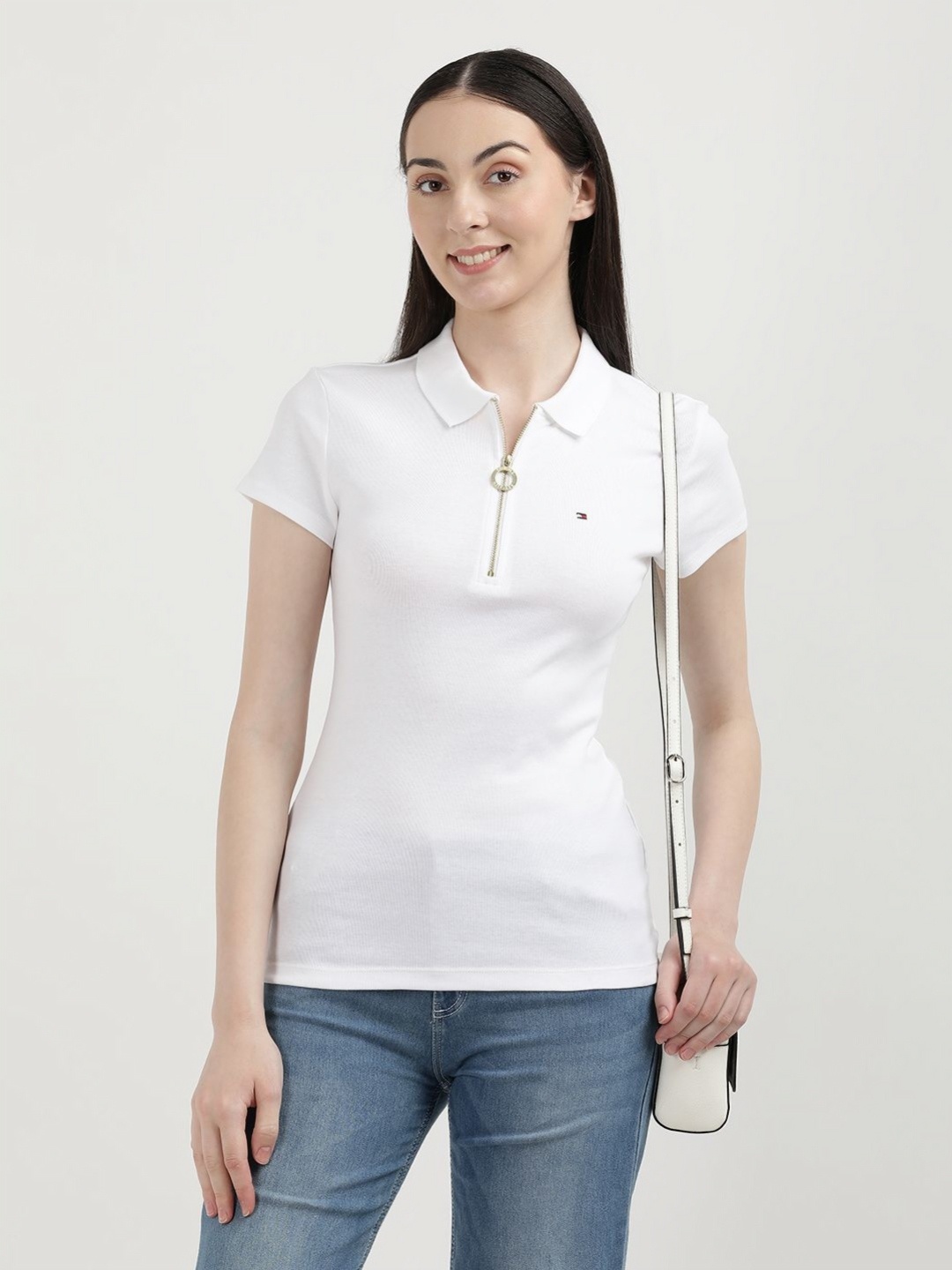 

Tommy Hilfiger Women Solid Polo Collar Cotton Slim Fit T-Shirt, White