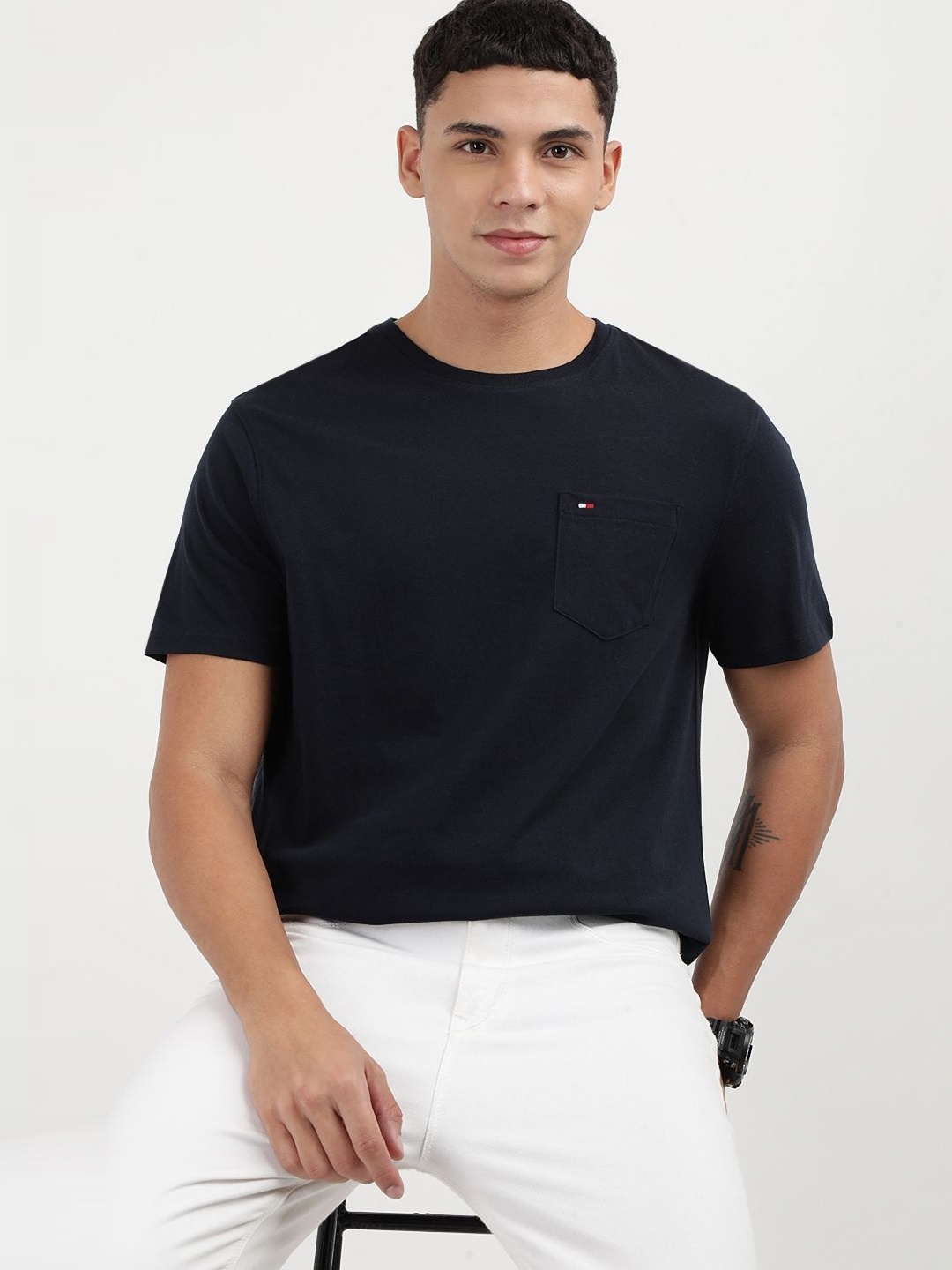 

Tommy Hilfiger Men Solid Round Neck Cotton T-Shirt, Blue