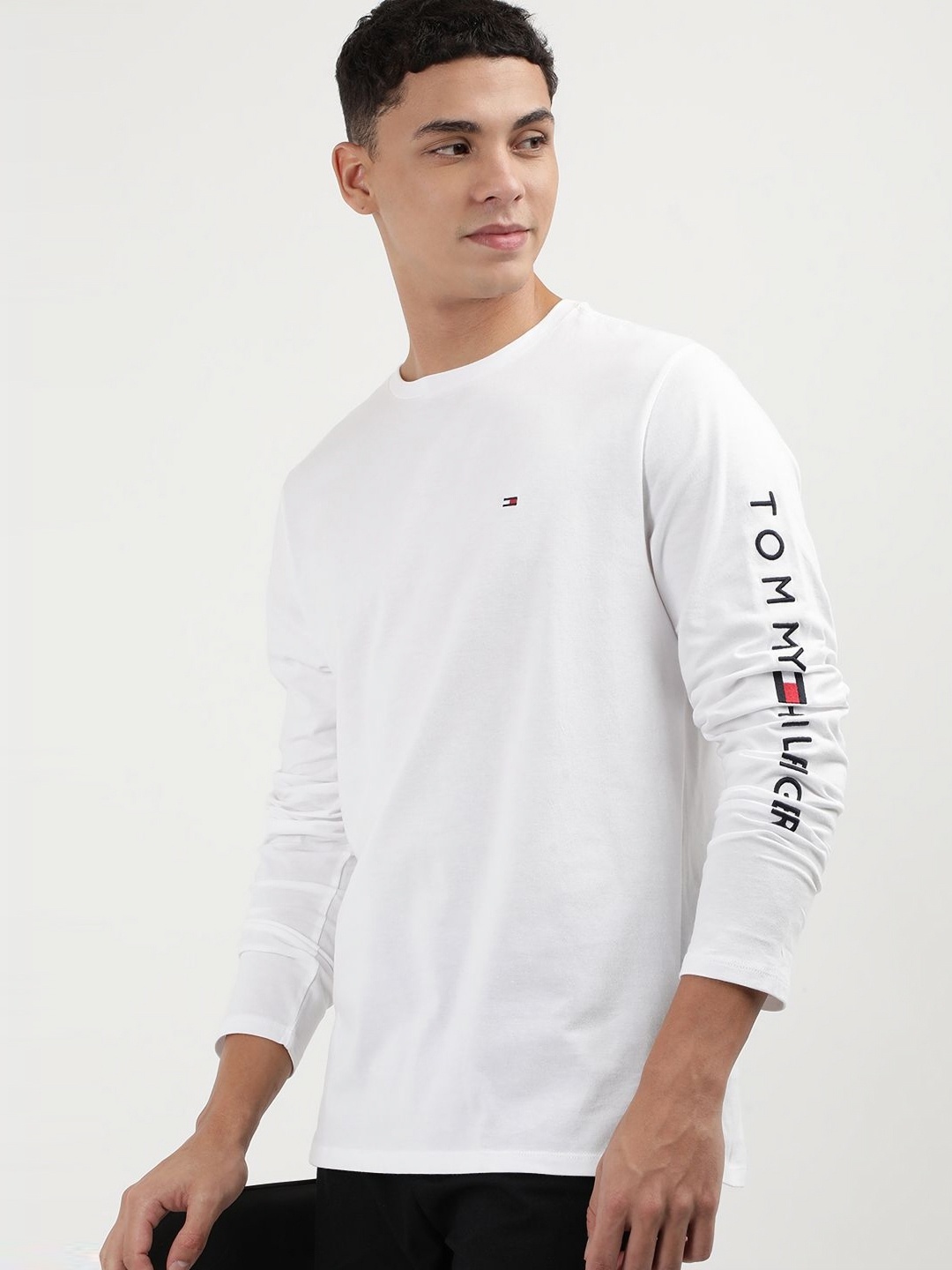 

Tommy Hilfiger Men Solid Round Neck Cotton T-Shirt, White