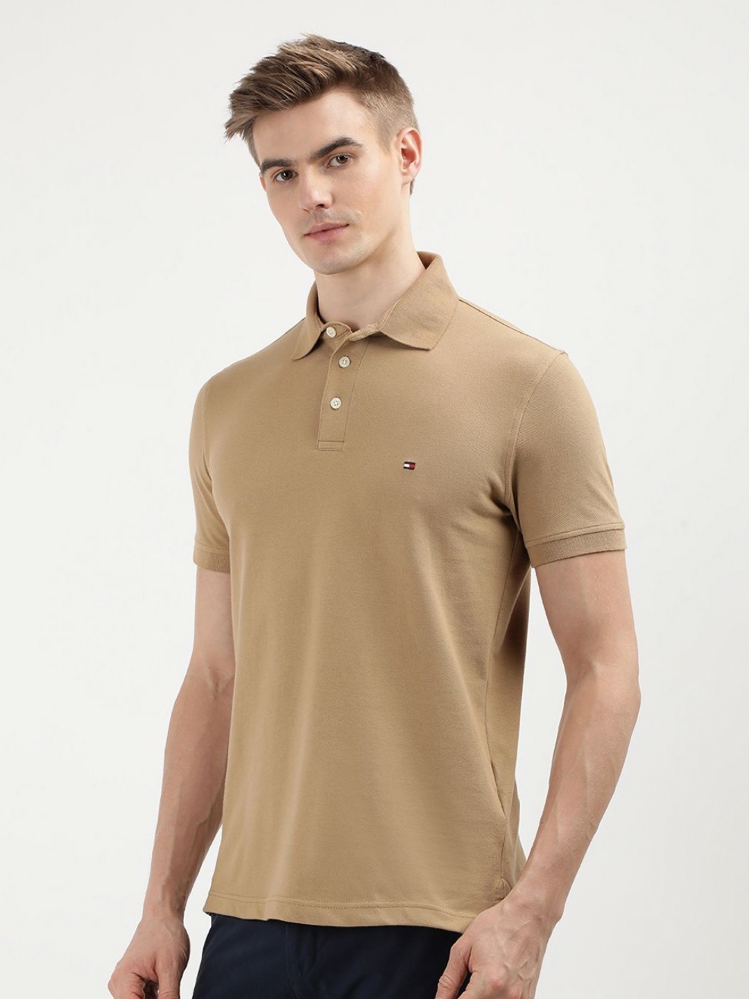 

Tommy Hilfiger Men Solid Polo Collar Cotton Slim Fit T-Shirt, Beige