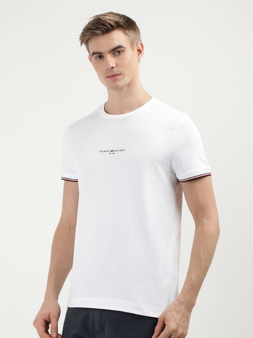 

Tommy Hilfiger Men Solid Round Neck Cotton Slim Fit T-Shirt, White
