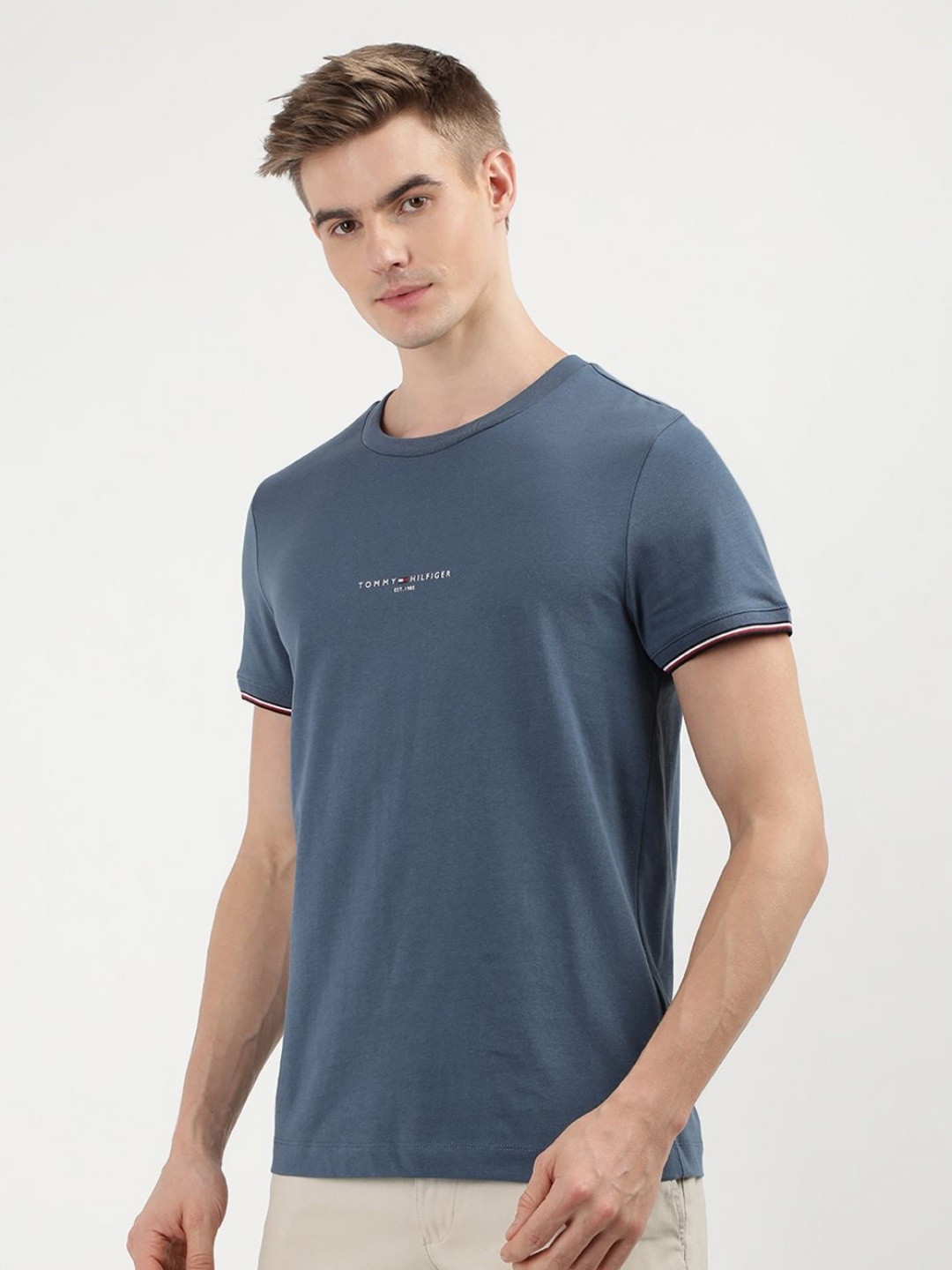 

Tommy Hilfiger Men Solid Round Neck Cotton Slim Fit T-Shirt, Blue
