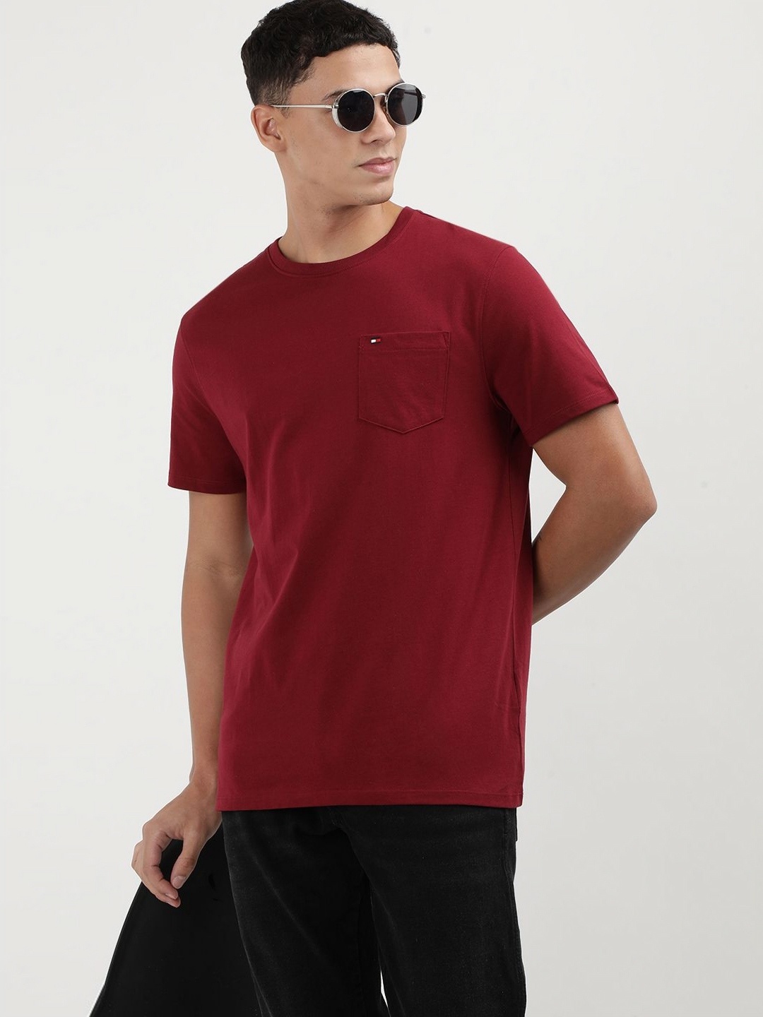 

Tommy Hilfiger Men Solid Round Neck Cotton T-Shirt, Red