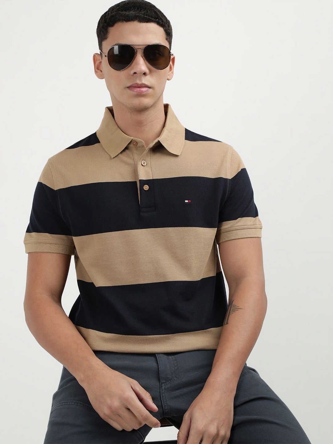

Tommy Hilfiger Men Striped Polo Collar Cotton Slim Fit T-Shirt, Beige