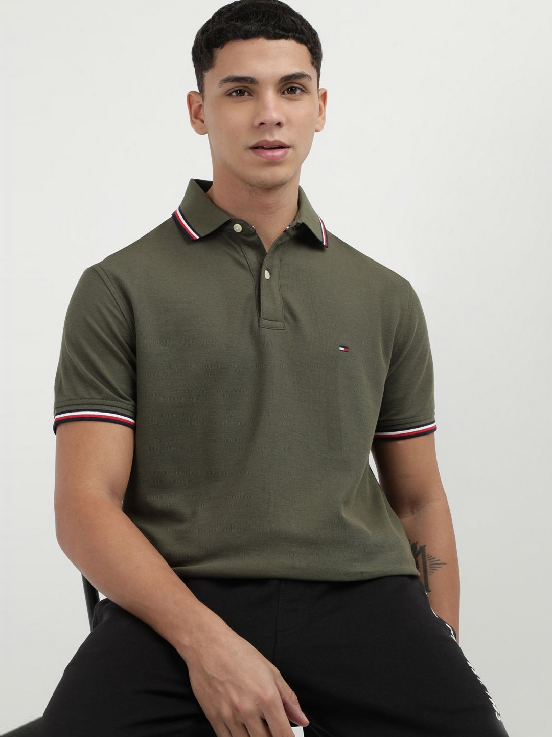 

Tommy Hilfiger Men Solid Polo Collar Cotton T-Shirt, Green
