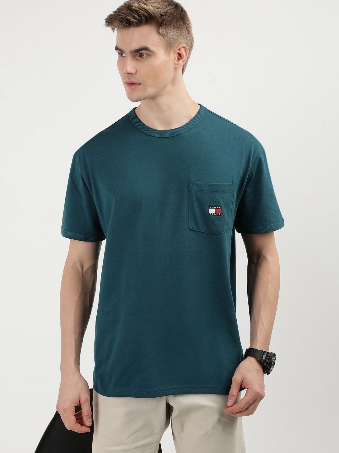 

Tommy Hilfiger Men Solid Round Neck Cotton T-Shirt, Green