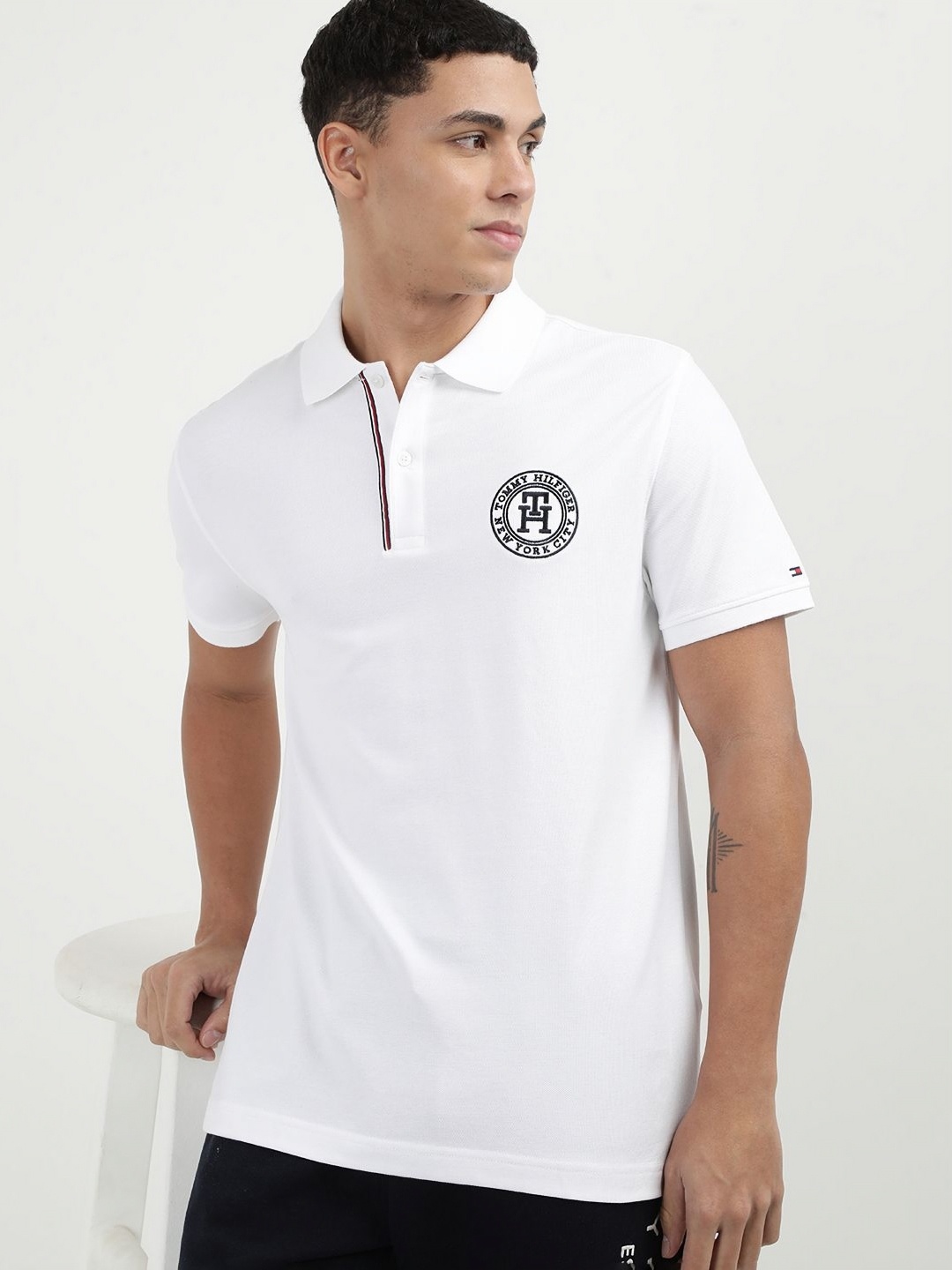 

Tommy Hilfiger Men Solid Polo Collar Cotton T-Shirt, White