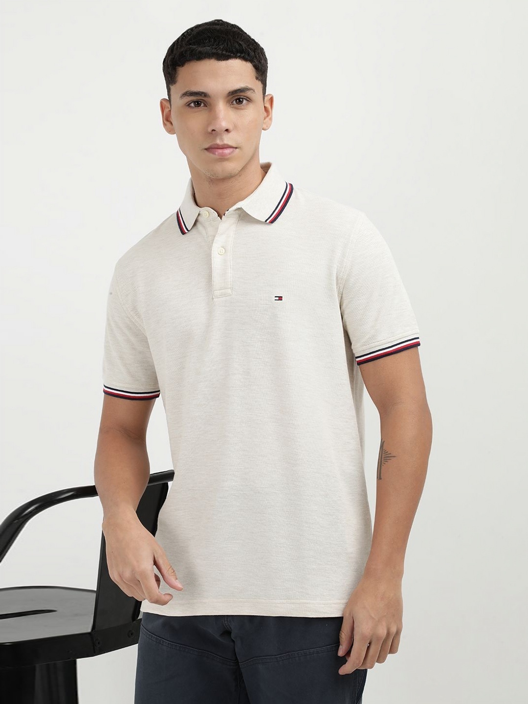 

Tommy Hilfiger Men Solid Polo Collar Cotton T-Shirt, Beige
