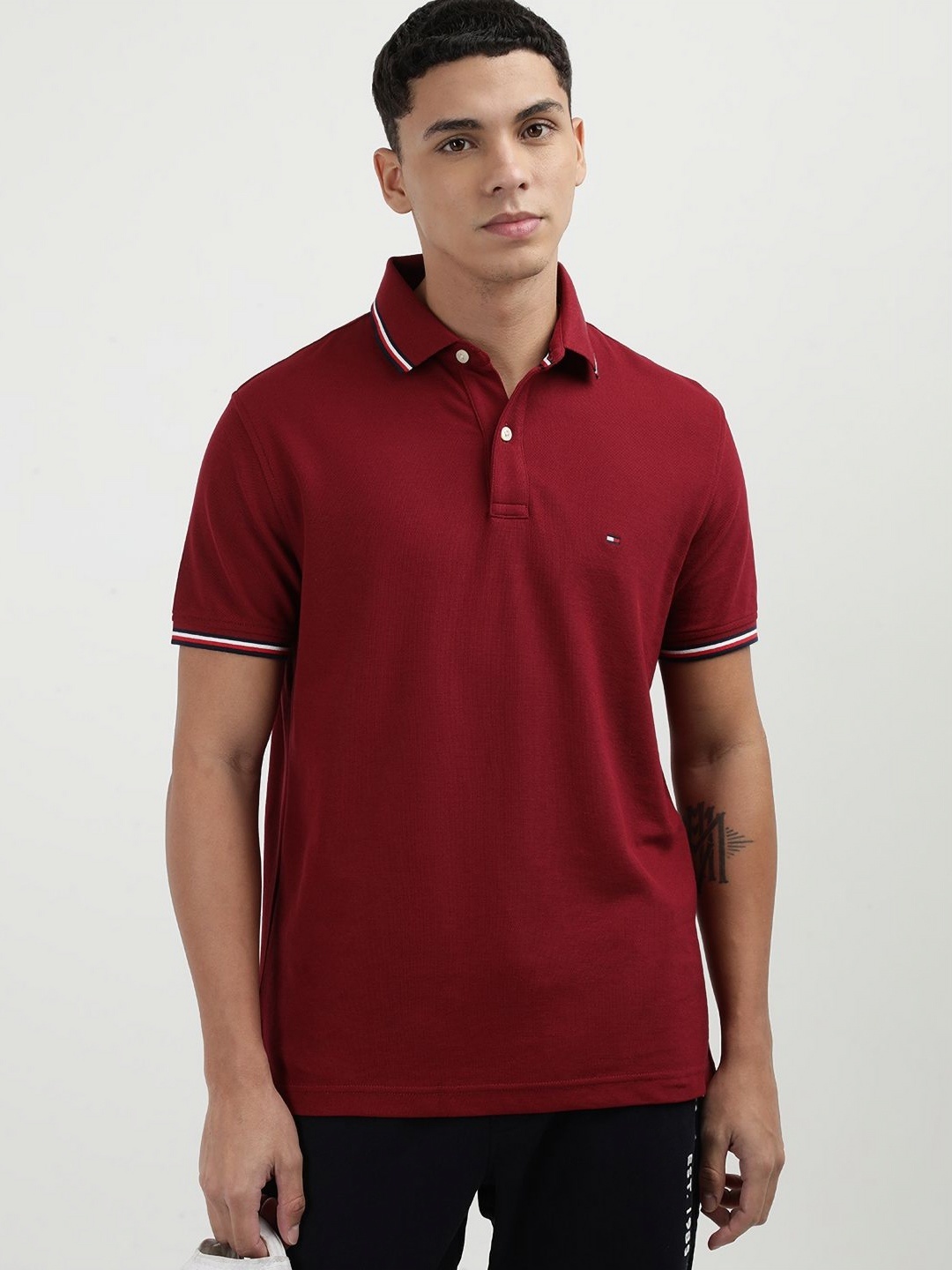 

Tommy Hilfiger Men Solid Polo Collar Cotton T-Shirt, Red