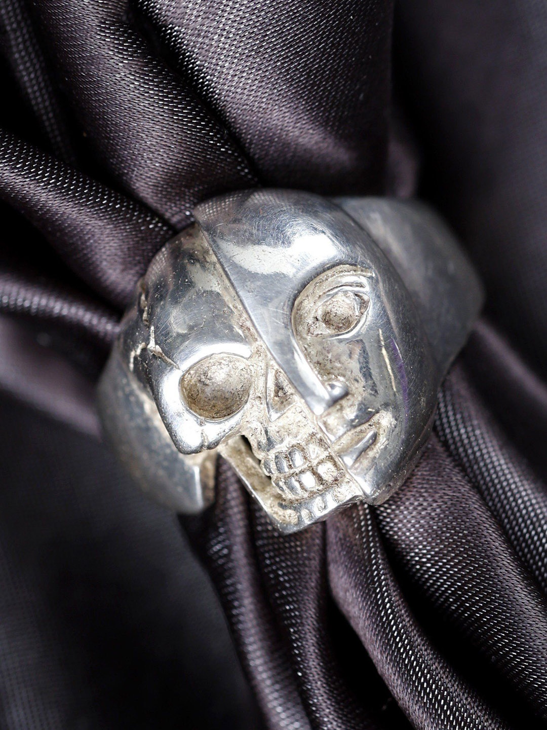 

Exotic India Sterling Silver Half Skull Half Face Ring