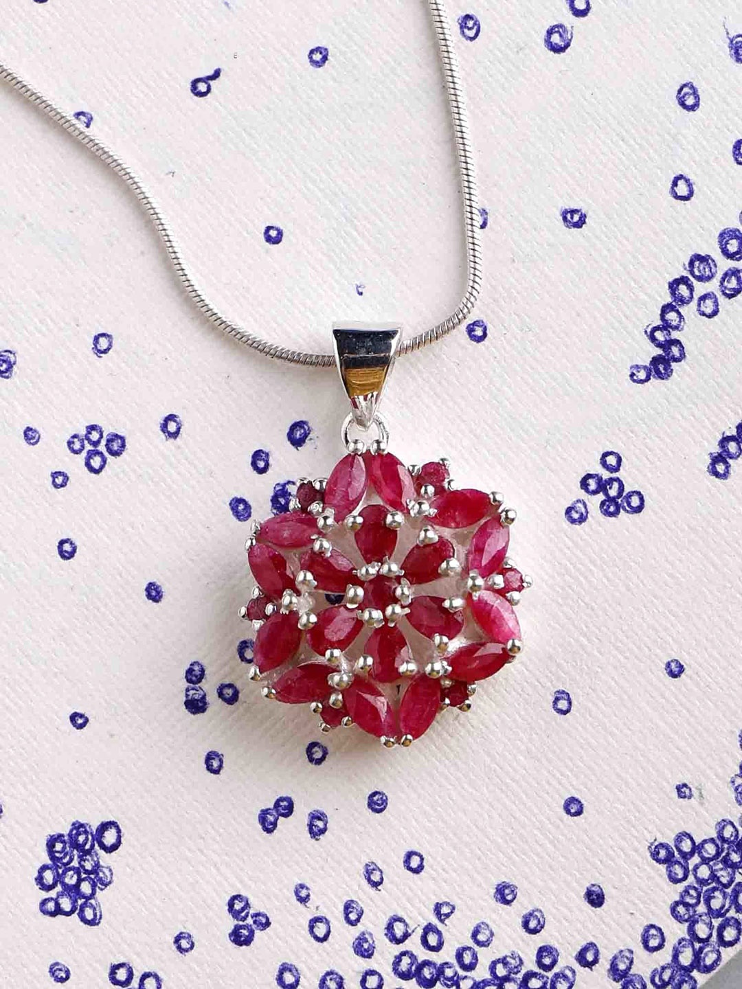 

Exotic India Faceted Ruby Chakra Sterling Silver Pendant