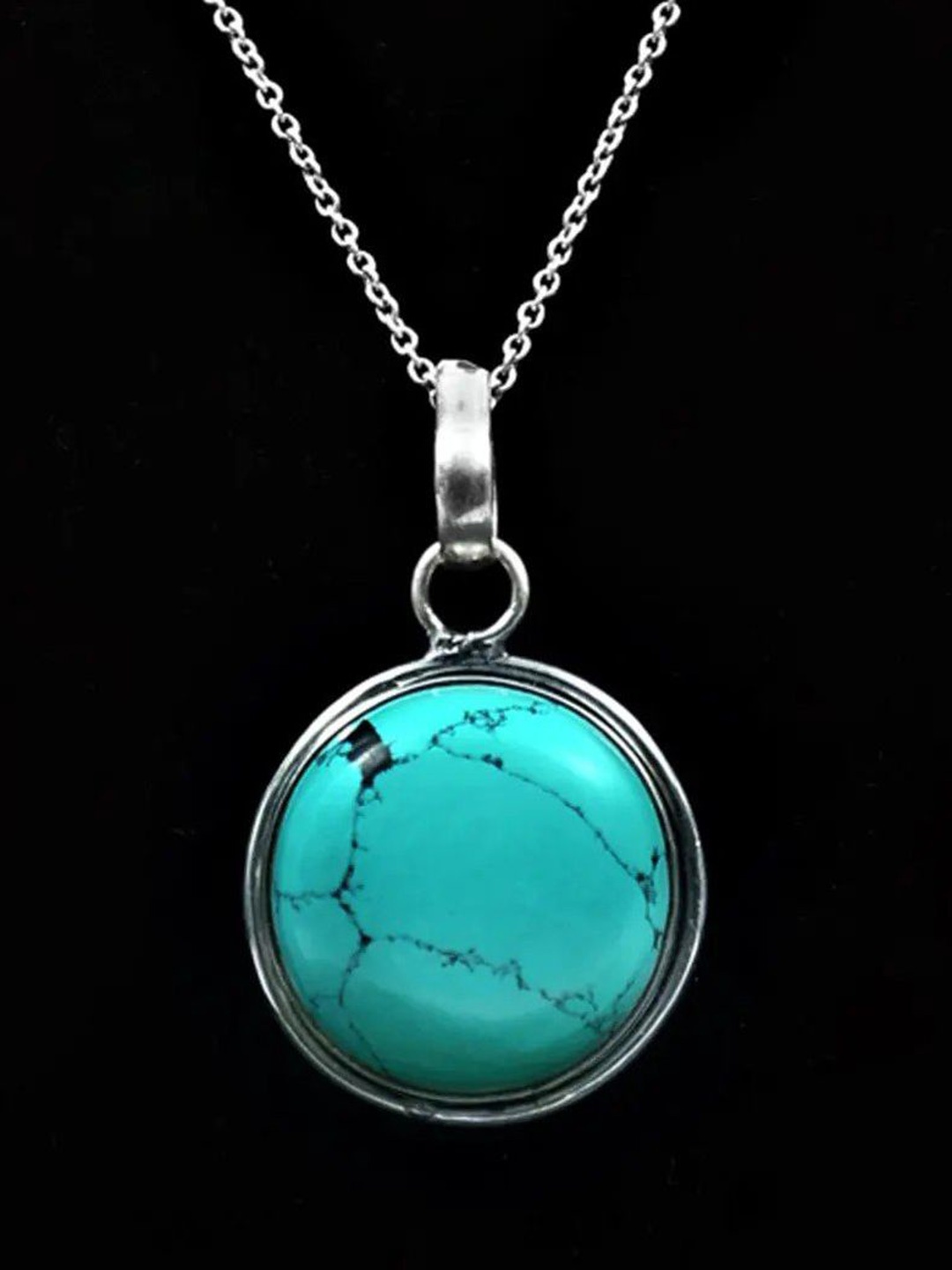 

Exotic India Turquoise Stone Round Shaped Sterling Silver Pendant, Metallic