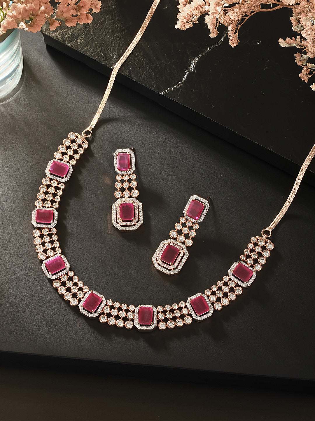 

Saraf RS Jewellery Rose Gold-Plated American Diamond Stone Studded jewellery Set