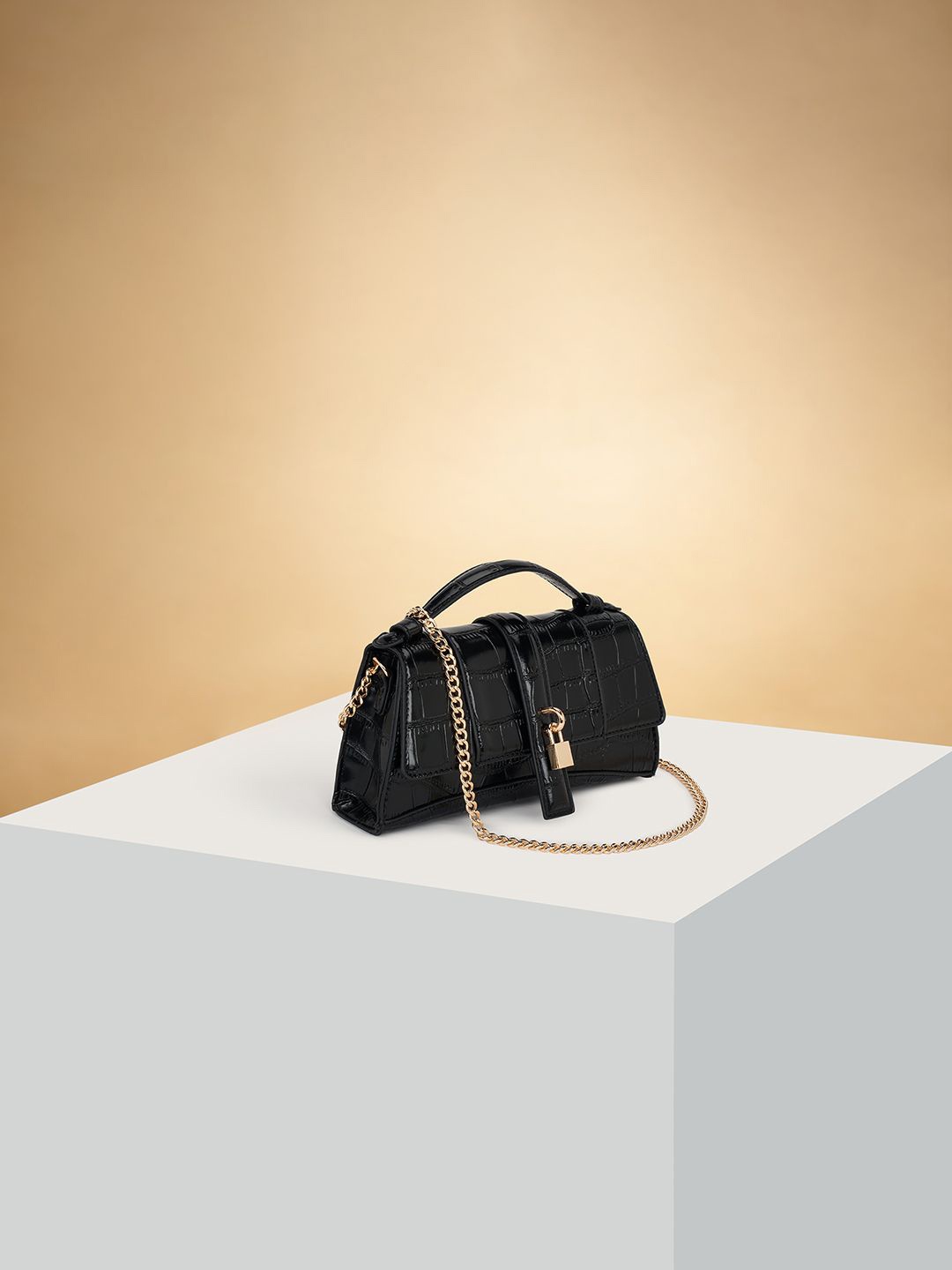 

Forever Glam by Pantaloons Striped PU Structured Sling Bag with Tasselled, Black