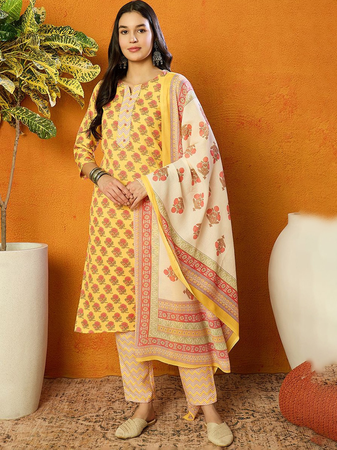 

Anouk Yellow Floral Printed Notched Round Neck Regular Kurta with Trousers & Dupatta