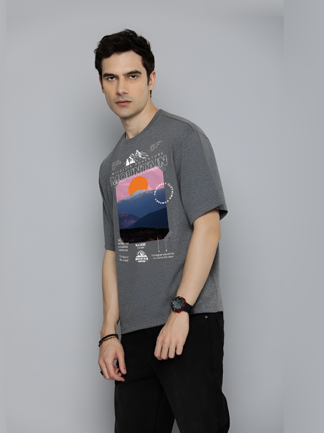 

The Roadster Lifestyle Co.Men Graphic Printed Round Neck Cotton Oversized T-Shirt, Charcoal