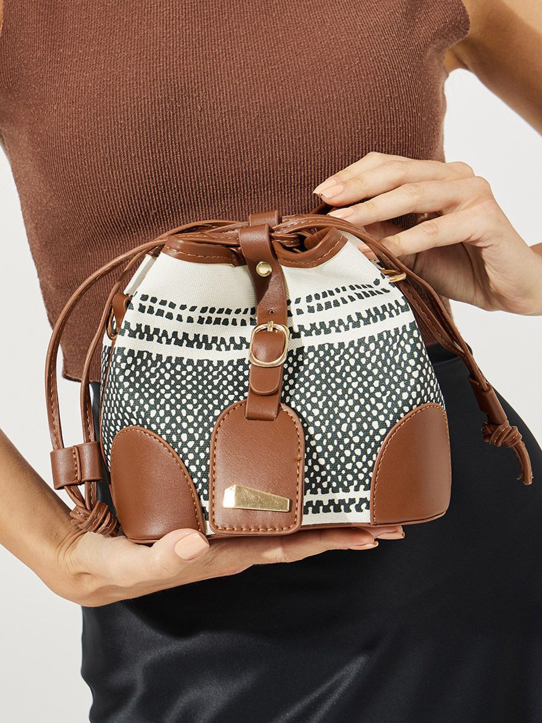 

Styli Women Abstract Printed Drawstring Bucket Sling Bag, Brown
