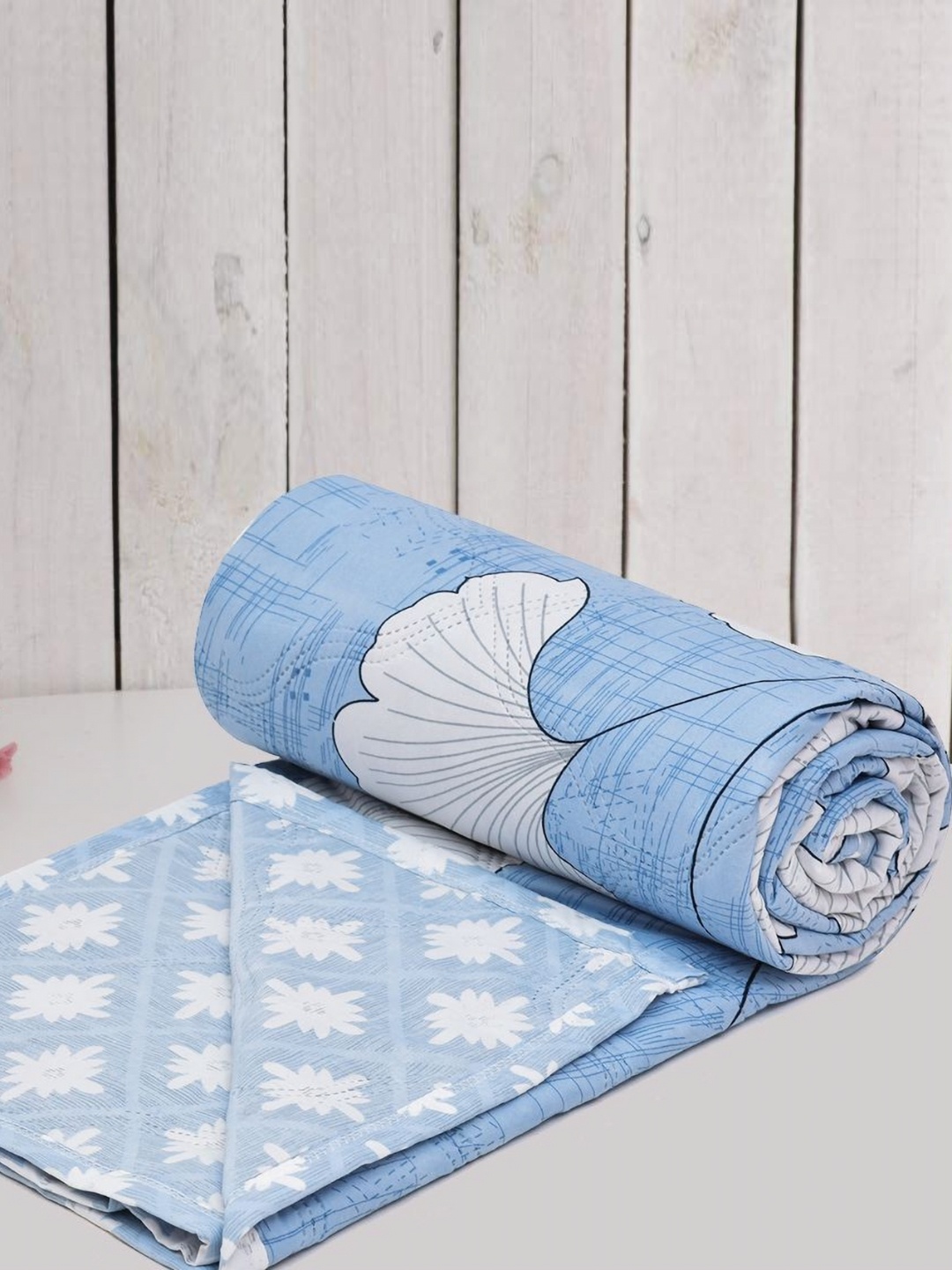 

RRC Turquoise Blue & White Floral Printed150 GSM Reversible Single Bed Dohar