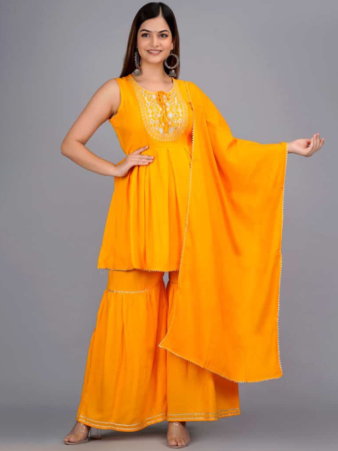 

SHOOLIN Ethnic Motifs Yoke Design Mirror Work A-Line Kurta With Sharara & With Dupatta, Yellow