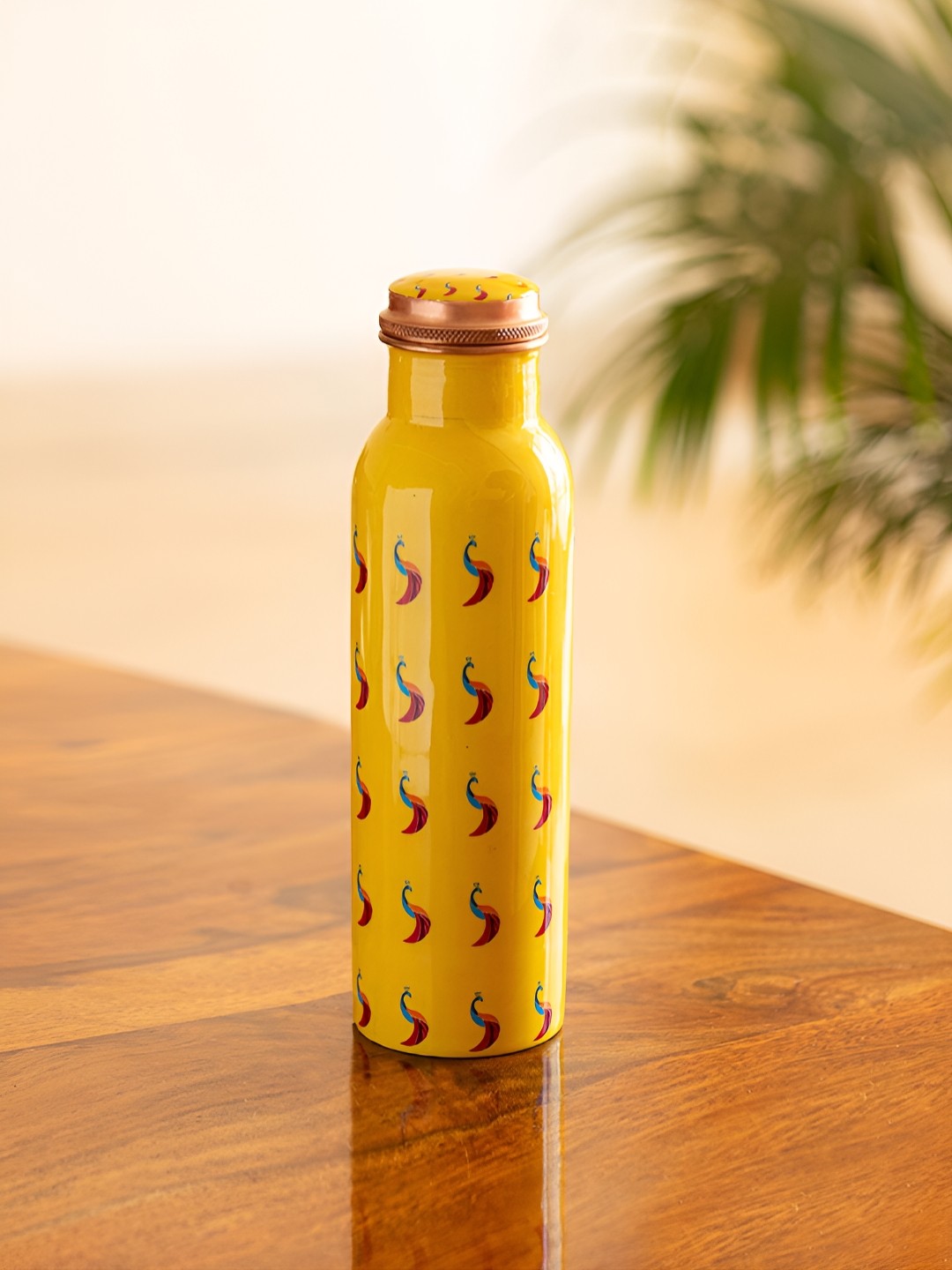 

ExclusiveLane Mustard & Blue Peacocks Printed Copper Water Bottle 1l