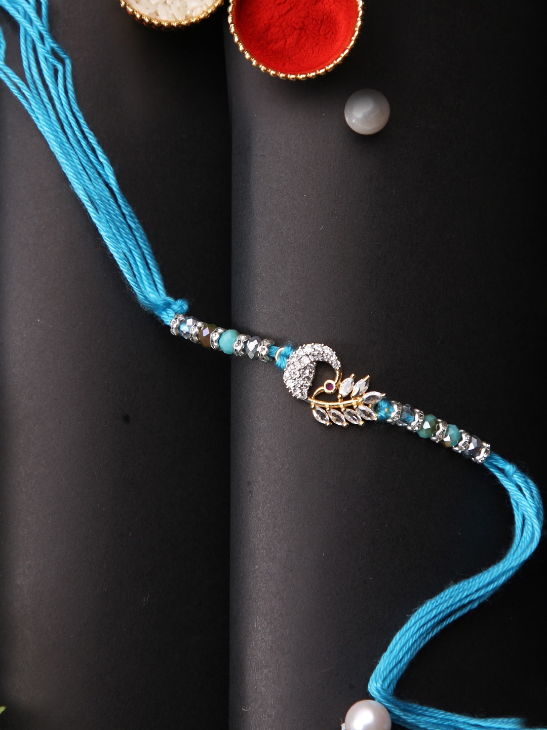 

House of Pataudi Stone Studded Peacock Designed Rakhi With Greeting Card & Roli Chawal, Silver