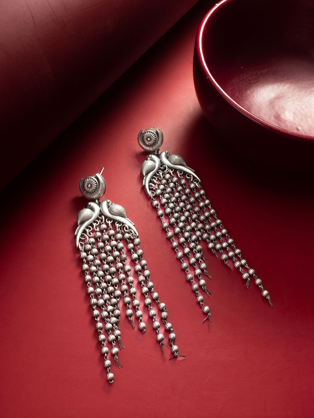 

aadita Silver-Plated Peacock Shaped Drop Earrings