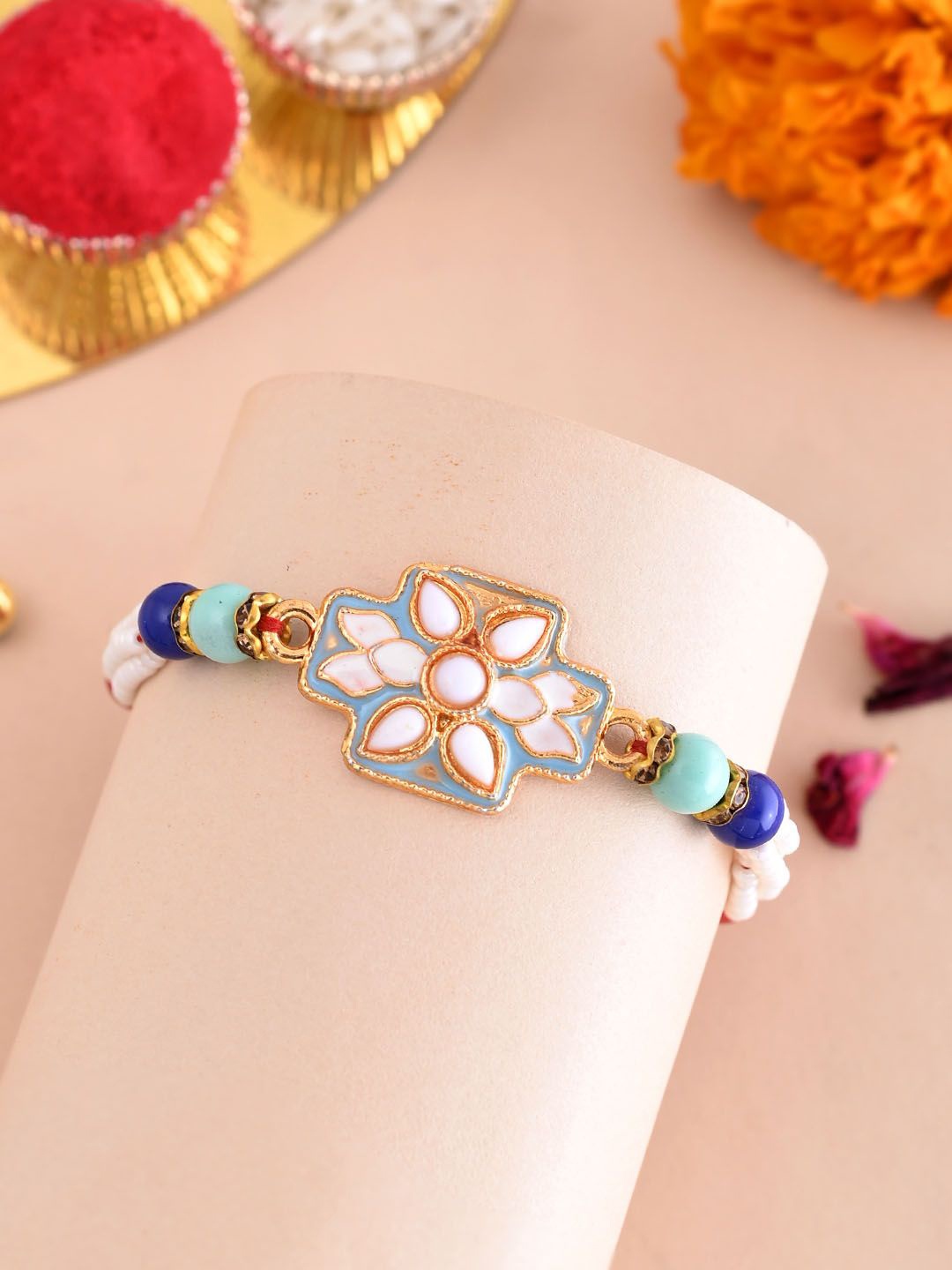 

Sangria White & Blue Floral Beaded Single Rakhi With Roli Chawal & Greetings Card
