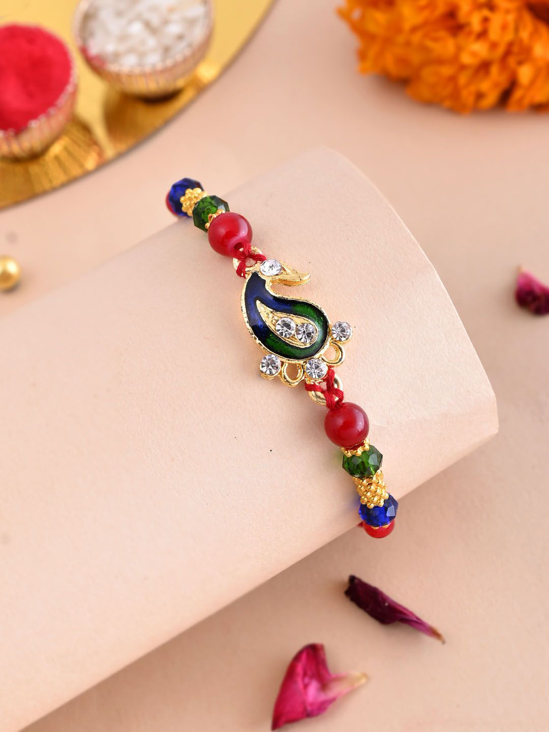 

Sangria Green Beaded Mango Work Rakhi With Roli Chawal & Greetings Card