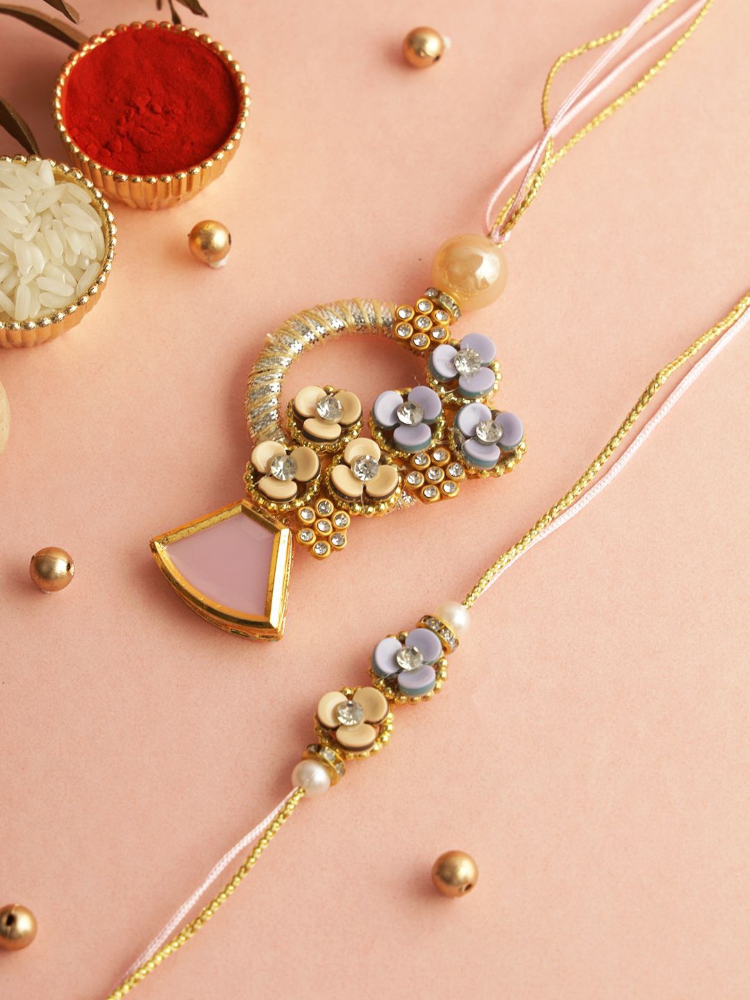 

Sangria Gold-Toned Floral Elegance Bhaiya Bhabhi Rakhi With Roli Chawal & Greetings Card