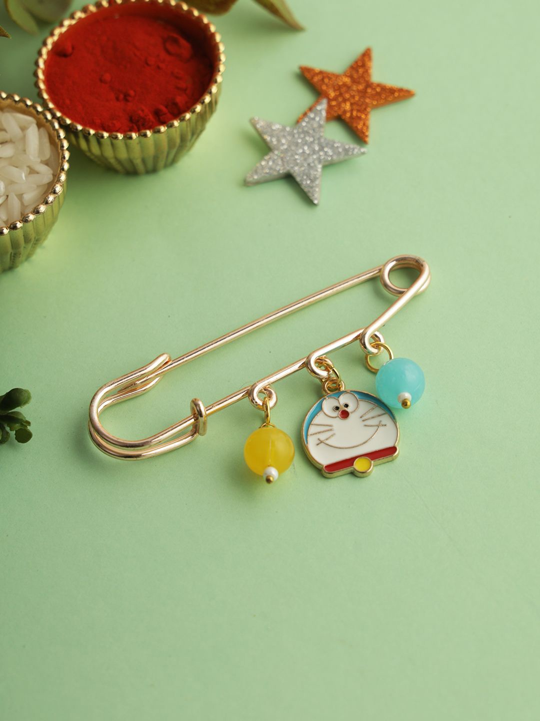 

Kook N Keech Rakhi Charm With Roli Chawal & Greeting Card, Gold