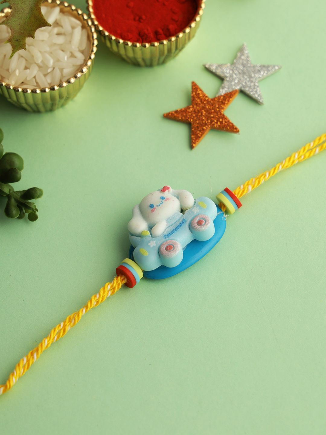 

Kook N Keech Blue Cinnamoroll Cartoon Thread Rakhi With Roli Chawal & Greeting Card