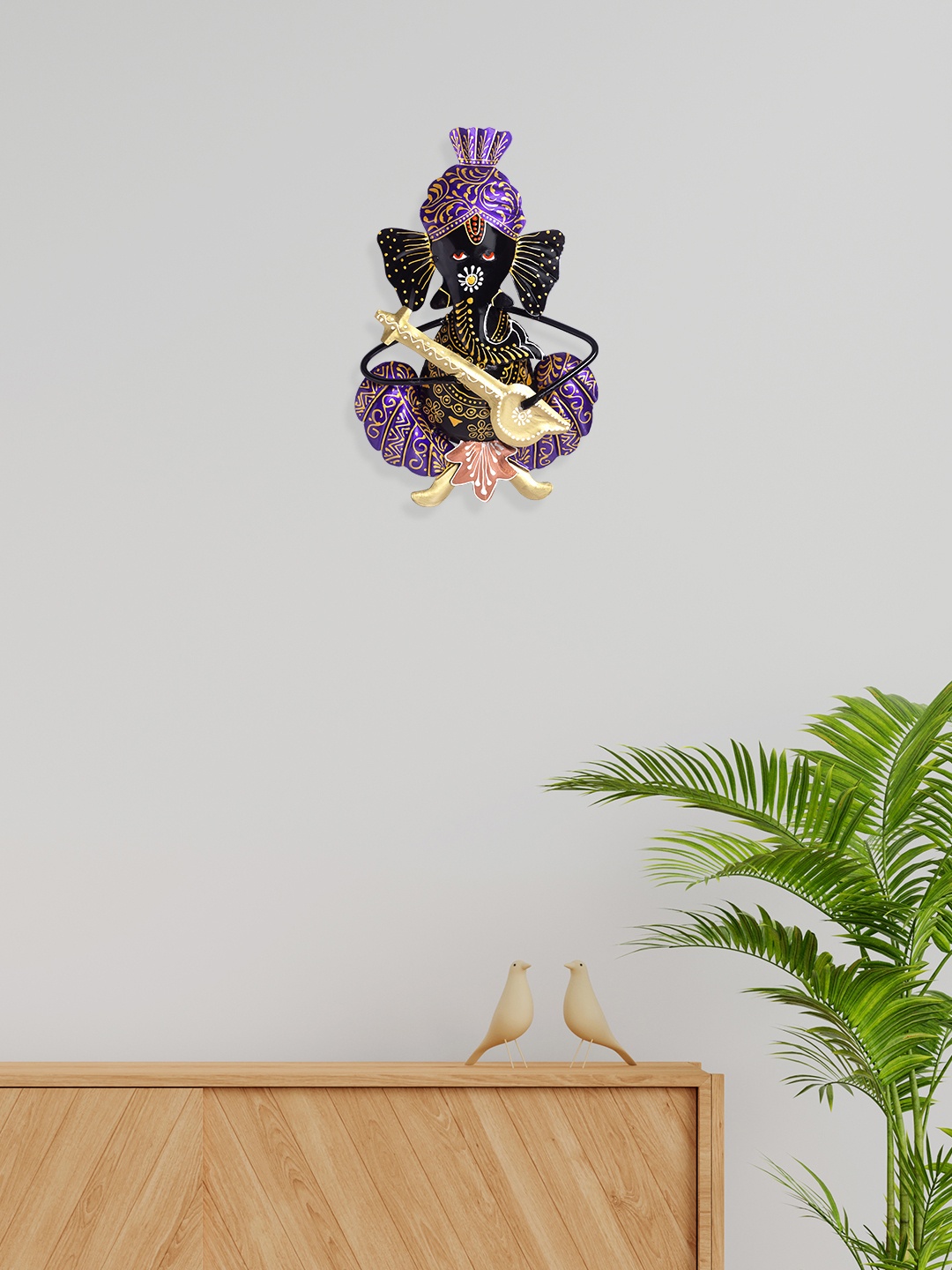 

Golden Peacock Purple & Black Lord Ganesh Playing Musical Instrument Wall Decor