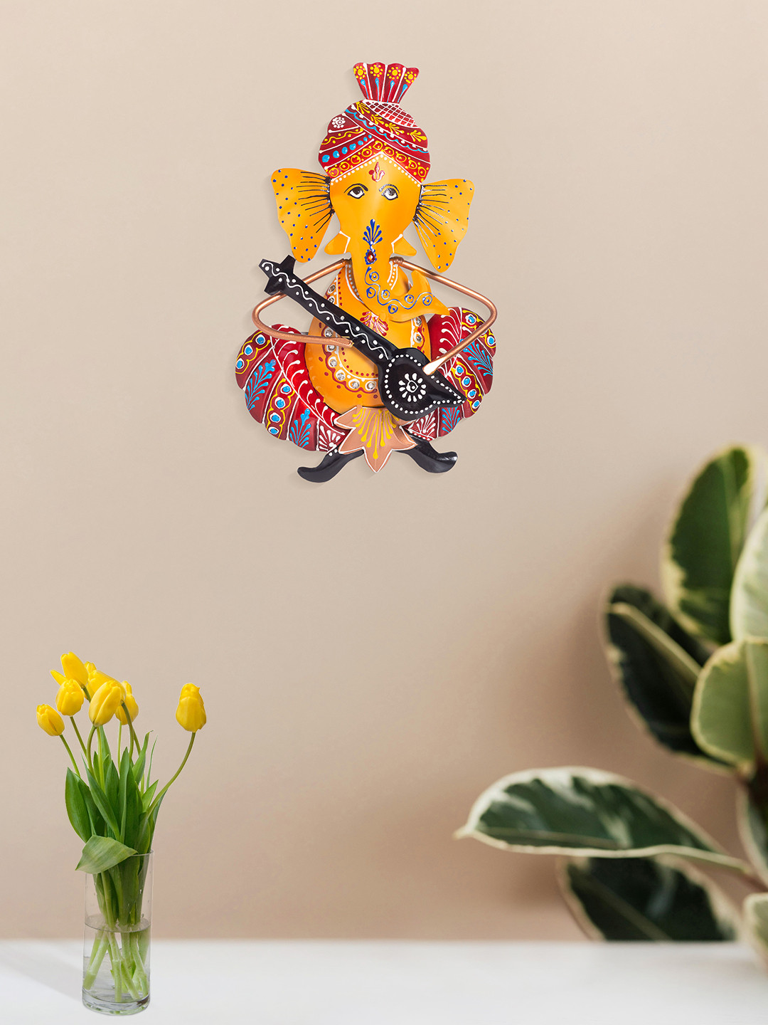 

Golden Peacock Red & Yellow Lord Ganesh Playing Musical Instrument Wall Hanging