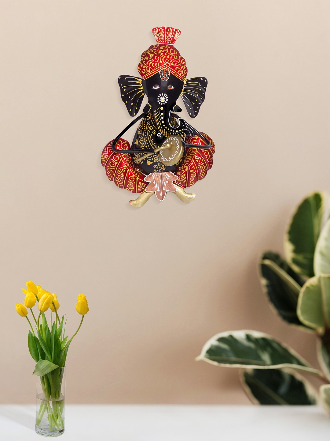 

Golden Peacock Orange & Black Lord Ganesh Playing Musical Instrument Wall Hanging