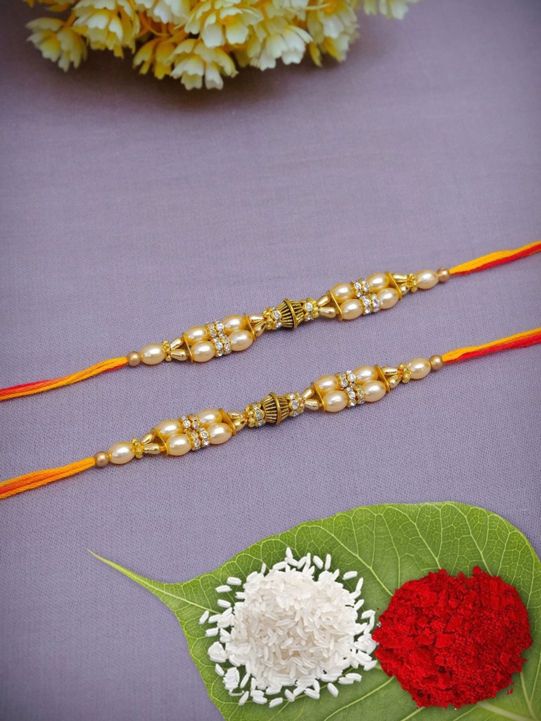 

Crunchy Fashion Pack Of 2 Rakhi With Roli Chawal, Off white
