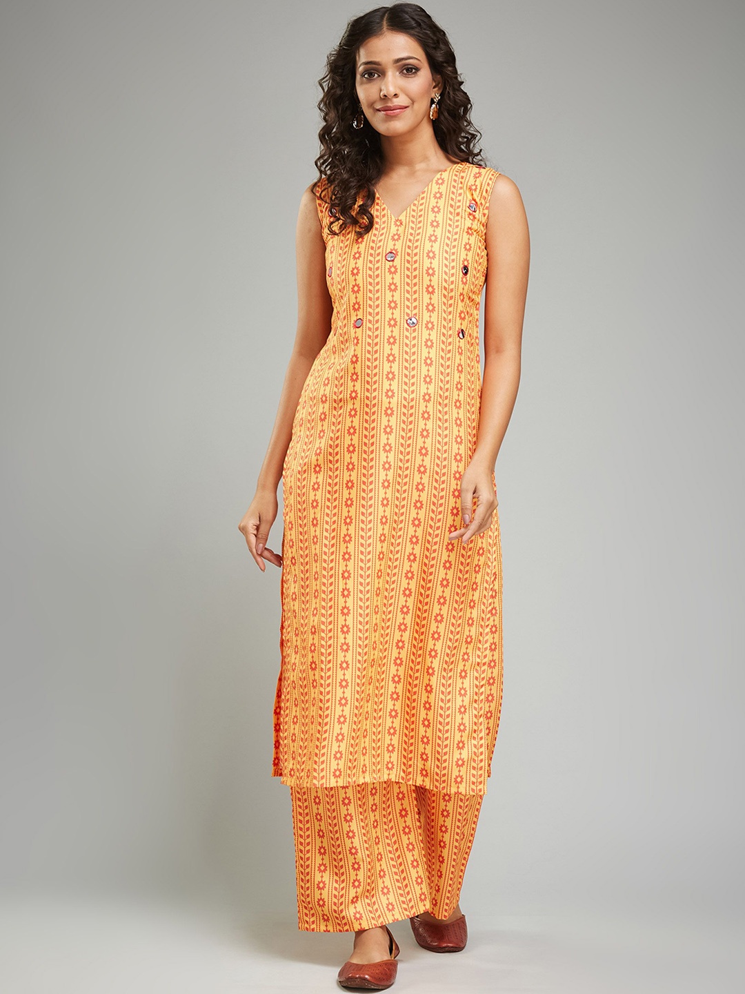 

KALINI Floral Printed Sleeveless Mirror Work Straight Kurta With Trousers, Mustard