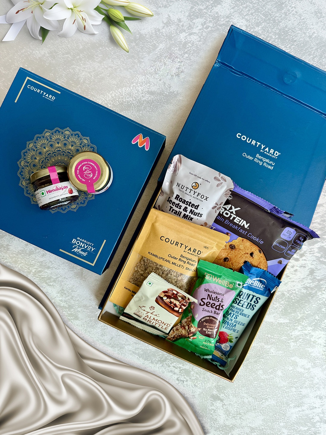 

Courtyard by Marriott - BLR ORR 8Pcs Assorted Gift Hamper, Blue