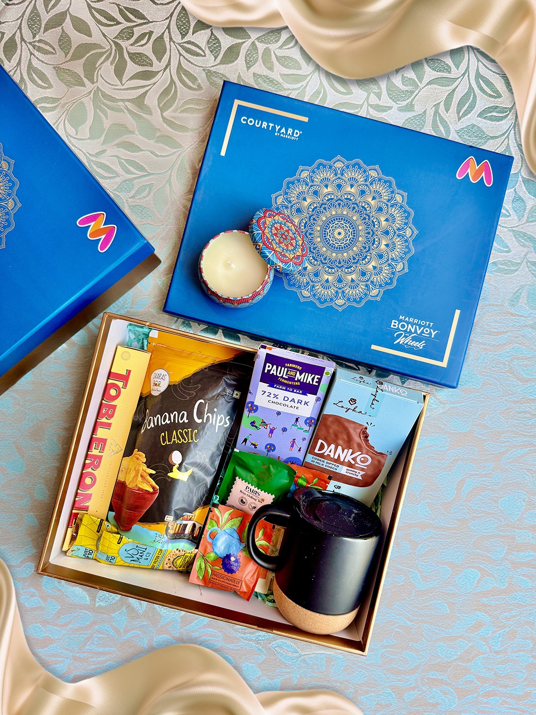 

Courtyard by Marriott - BLR ORR 13Pcs Chocolate & Cookies Assorted Gift Hamper, Blue